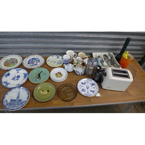 2329 - One large and four small boxes of assorted items including cake tins, pots and pans, china, etc.