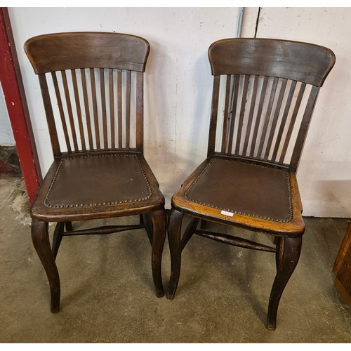 145 - A pair of Edward VII beech desk chairs