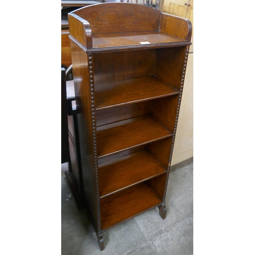 162 - An early 20th Century oak open bookcase