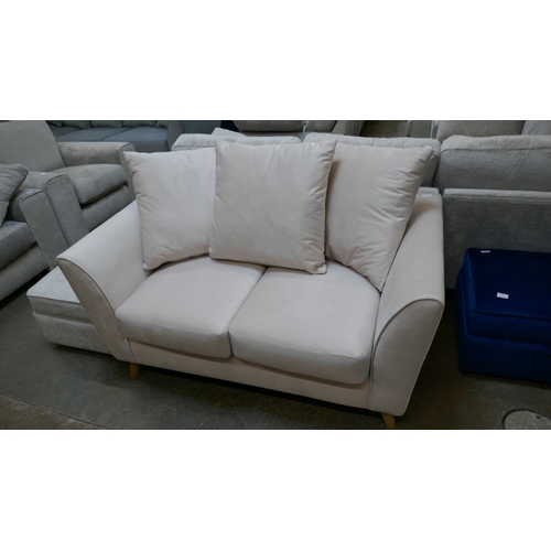 1429 - A light mink velvet two seater sofa