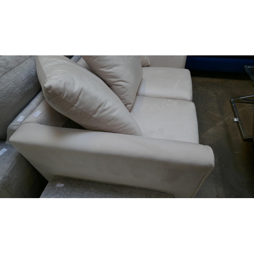 1429 - A light mink velvet two seater sofa