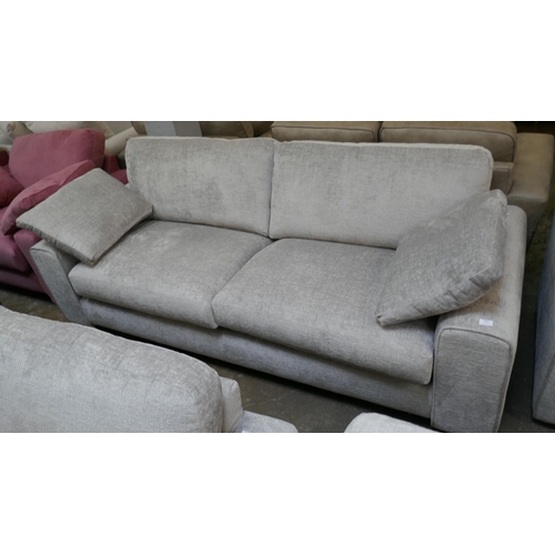 1439 - A pewter velvet four seater sofa