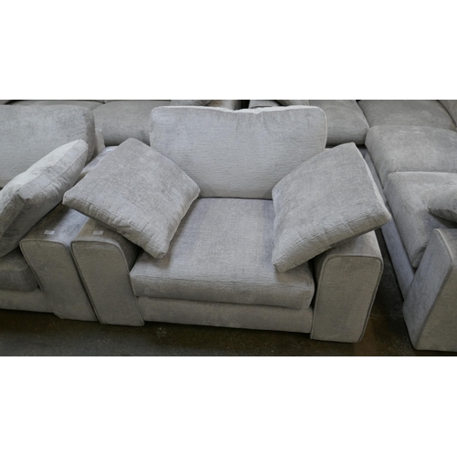 1443 - A pewter velvet armchair