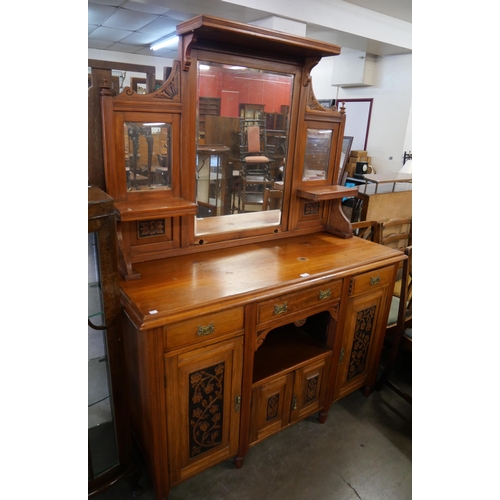 247 - A late Victorian carved walnut mirrorback chiffonier