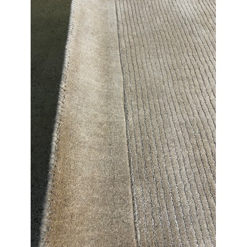 1451 - A handmade 100% wool pile, cream ground carpet, 200cm x 300cm