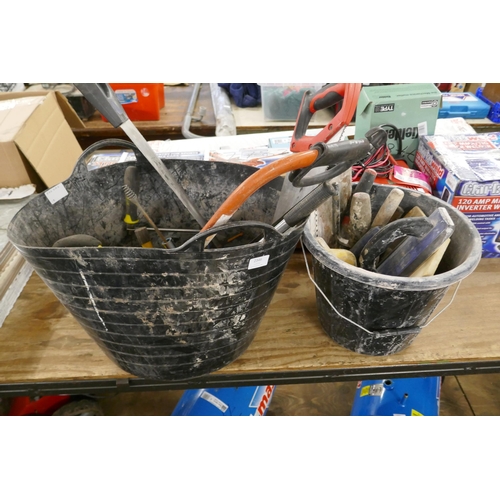 2346 - A quantity of hand tools including plastering trowels and floats, hand saws, hammers, screwdrivers, ... 