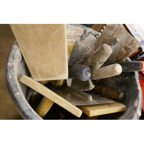 2346 - A quantity of hand tools including plastering trowels and floats, hand saws, hammers, screwdrivers, ... 