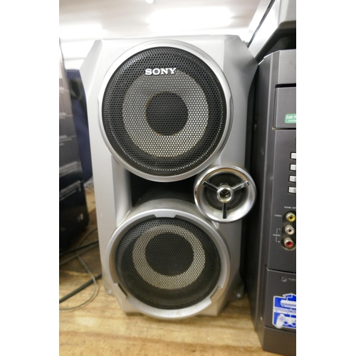 2373 - A Sony Hi-fi system, Disc exchange mini hi-fi component system MHC-RG33 and PS-J20 turn table with a... 