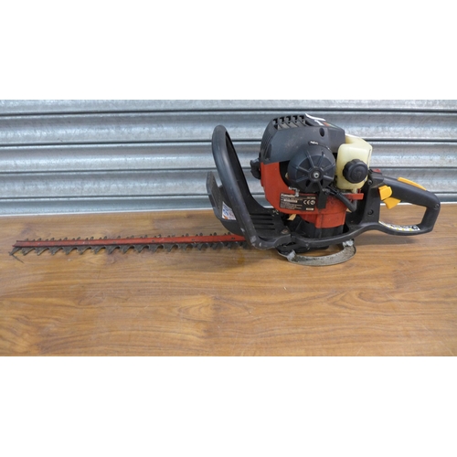 2214 - A Homelite Mighty Lite petrol driven hedge cutter