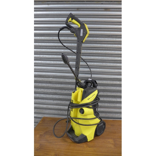 2228 - A Karcher K4 full control jet wash with hose and lance