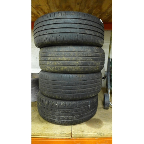 2238 - A set of four 16” alloy wheels to fit a Ford Fiesta with four used tyres