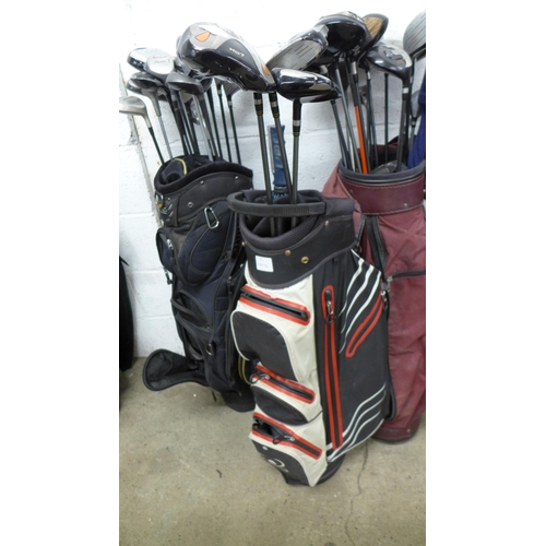 2247 - 3 Bags of golf clubs including Confidence HQ7, Evolution II, Pro Impact, Taylor Made R7 Quad, Donnay... 