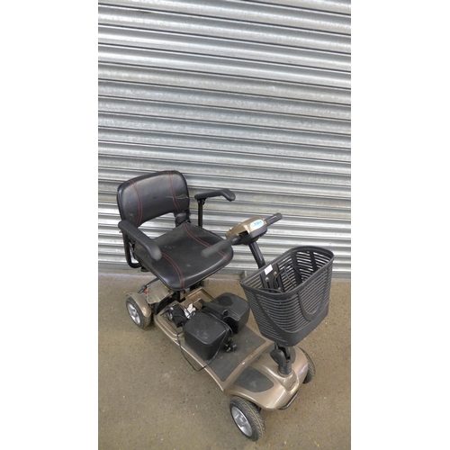 2261 - An Eden Mobility lightweight 4-wheel mobility scooter with charger and key and a pair of size 4 UK f... 