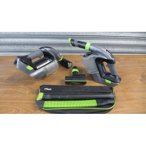 2283 - Two GTech Li-ion cordless hand held vacuum cleaner and a quantity of various attachments