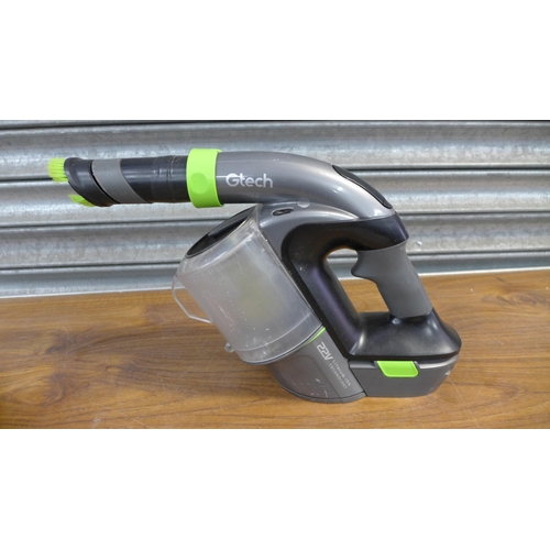 2283 - Two GTech Li-ion cordless hand held vacuum cleaner and a quantity of various attachments