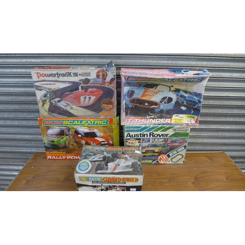 2287 - A quantity of Scalextric and other slot racing games including Grand Prix 8, Austen Rover Class Cham... 