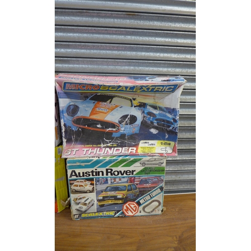 2287 - A quantity of Scalextric and other slot racing games including Grand Prix 8, Austen Rover Class Cham... 