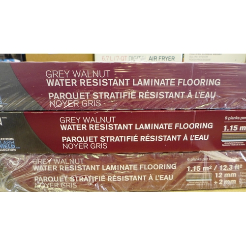 3081 - 3 packs of Grey Walnut Laminate Flooring (321-292,293) *This lot is subject to VAT