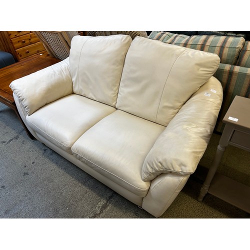 1524 - Cream leather two seater sofa