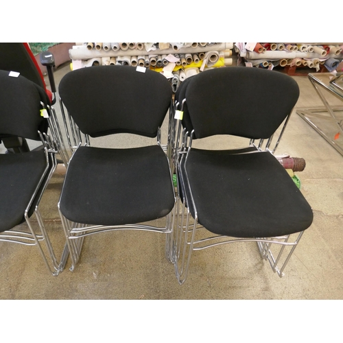 1528 - A set of seven chrome and black stacking chairs