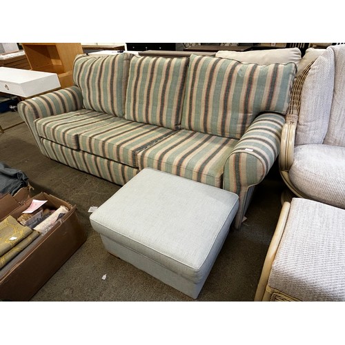 1532 - Striped upholstered three seater sofa and footstool