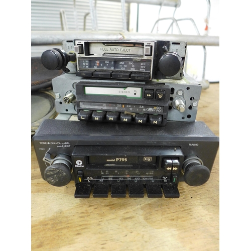 2325 - A collection of vintage automotive stereo equipment including tape decks and tweeter speakers