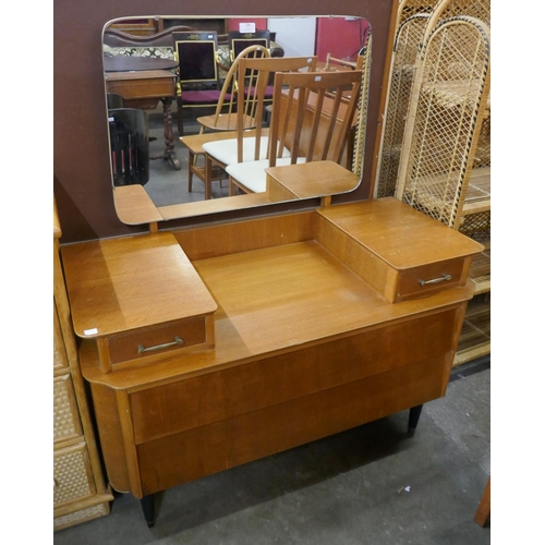 34 - A teak dressing table