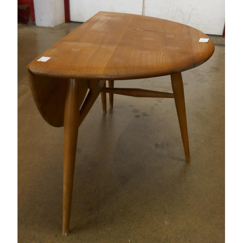 8 - An Ercol elm and beech drop-leaf coffee table