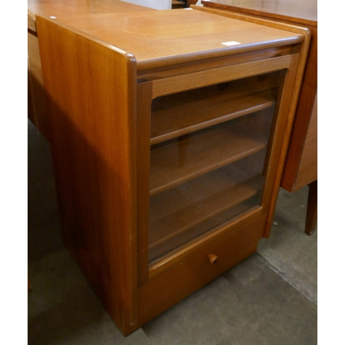 82 - A teak record cabinet