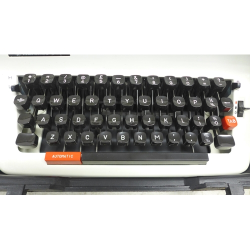 2069 - A Hermes 305 typewriter in hard carry case