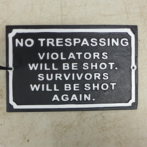 2073 - A No Trespassing cast metal sign * this lot is subject to VAT