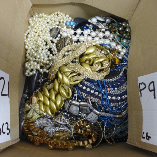 2092 - A box of costume jewelry and a bag of unusual costume jewelry