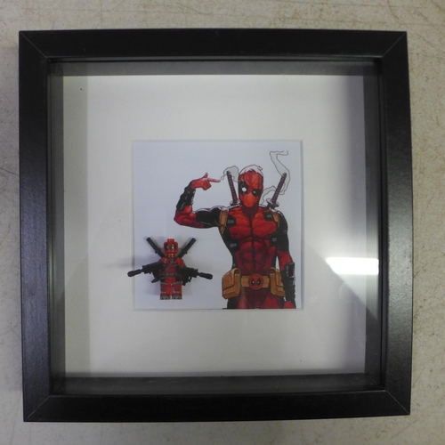 2105 - Four Lego Super Hero framed figures including Deadpool, Captain America, Iron Man and Thor