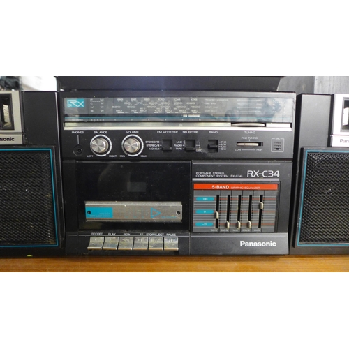 2114 - A quantity of radio and stereo equipment including a Panasonic RX-C34 portable stereo component syst... 