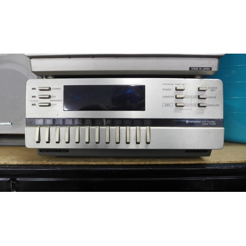 2122 - A Hitachi VT-7000E portable video cassette recorder and a Hitachi VT-TV70E video tuner