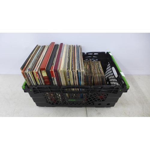 2127 - A box of aproox. 50 LPs including rock, pop, country, classical and approx. 40 7” singles from the 7... 