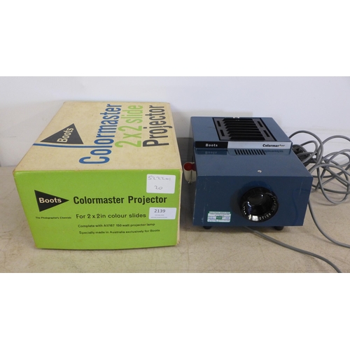 2139 - A Boots Colourmaster 2 x 2in Colour slide projector with an A1/167 150w projector lamp, in original ... 