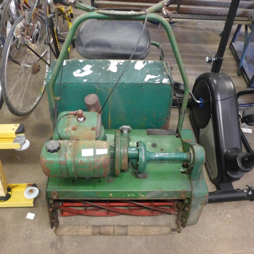 2159 - A vintage Ransomes Twenty Four sit in petrol driven cylinder mower, with grass box