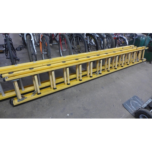 2161 - A double 14-rung yellow fiberglass ladder * this lot is subject to VAT