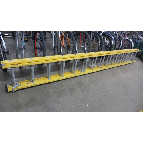 2162 - A double 14-rung yellow fiberglass ladder * this lot is subject to VAT