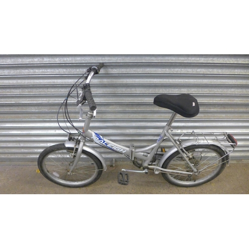 2179 - A Raleigh folding 6-speed City bike complete with pannier rack and mud guards