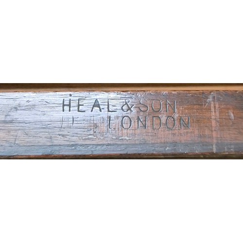 165 - A Victorian Heal & Son, London mahogany single drawer writing table