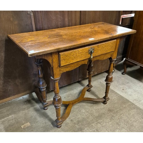 224 - A George I style oak single drawer side table