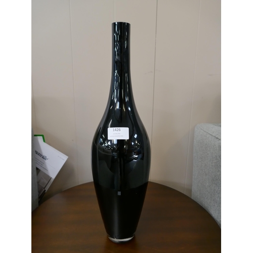 1426 - A black glass vase