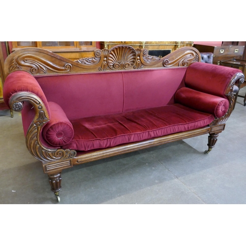 120 - A Regency carved mahogany and red fabric upholstered scroll end settee