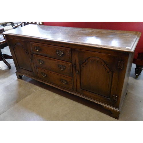 123 - A George III style oak dresser