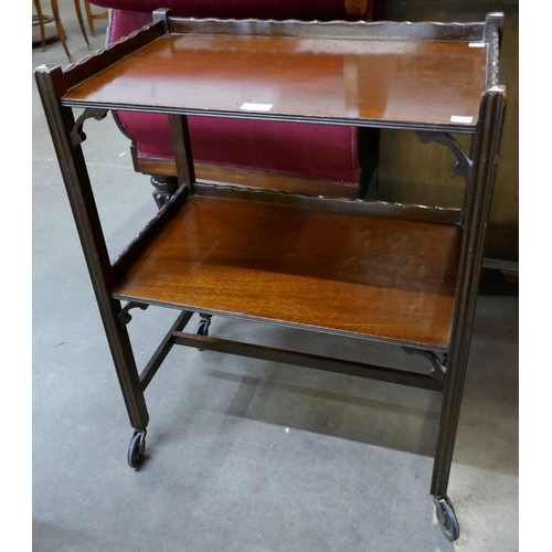 127 - An Edward VII mahogany two tier occasional table