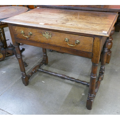 137 - A William III oak single drawer side table