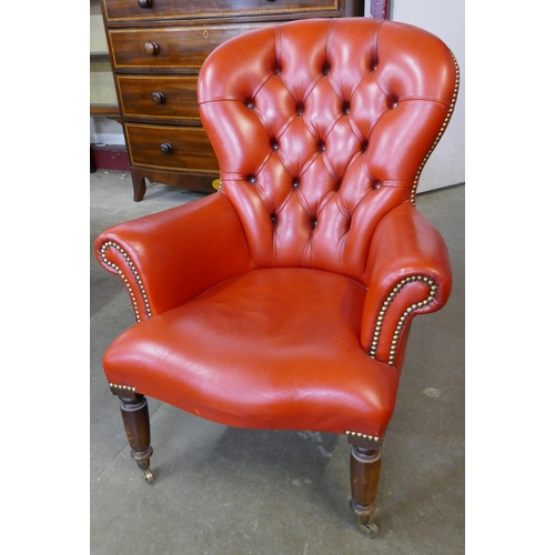 154 - A Victorian style red leather lady's chair