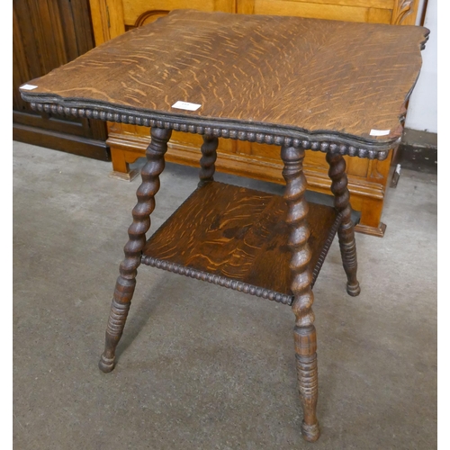 159 - A Victorian oak barleytwist two tier occasional table